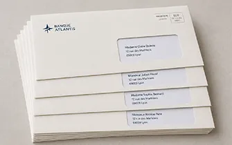 Mailing publicitario impreso con cartas personalizadas y sobres con ventana